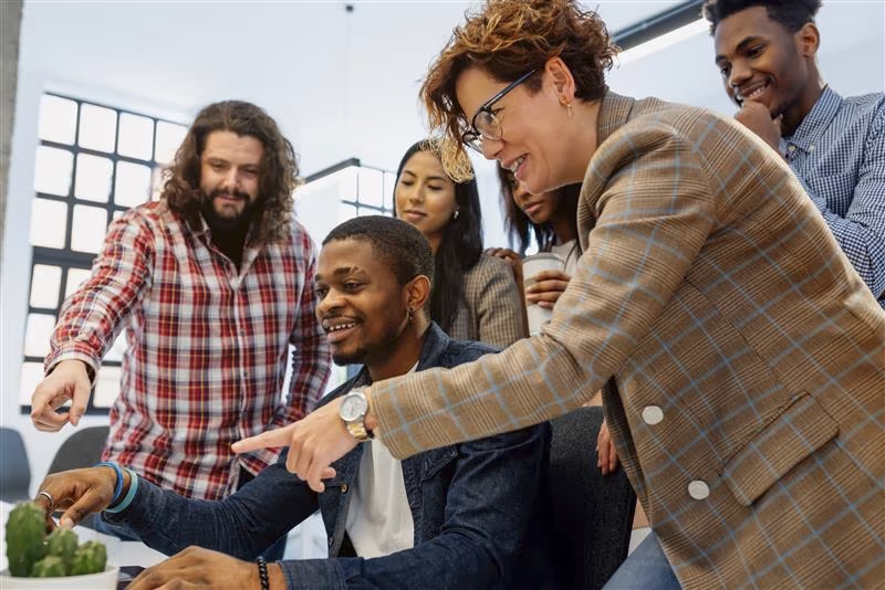 Law students gathered around computer