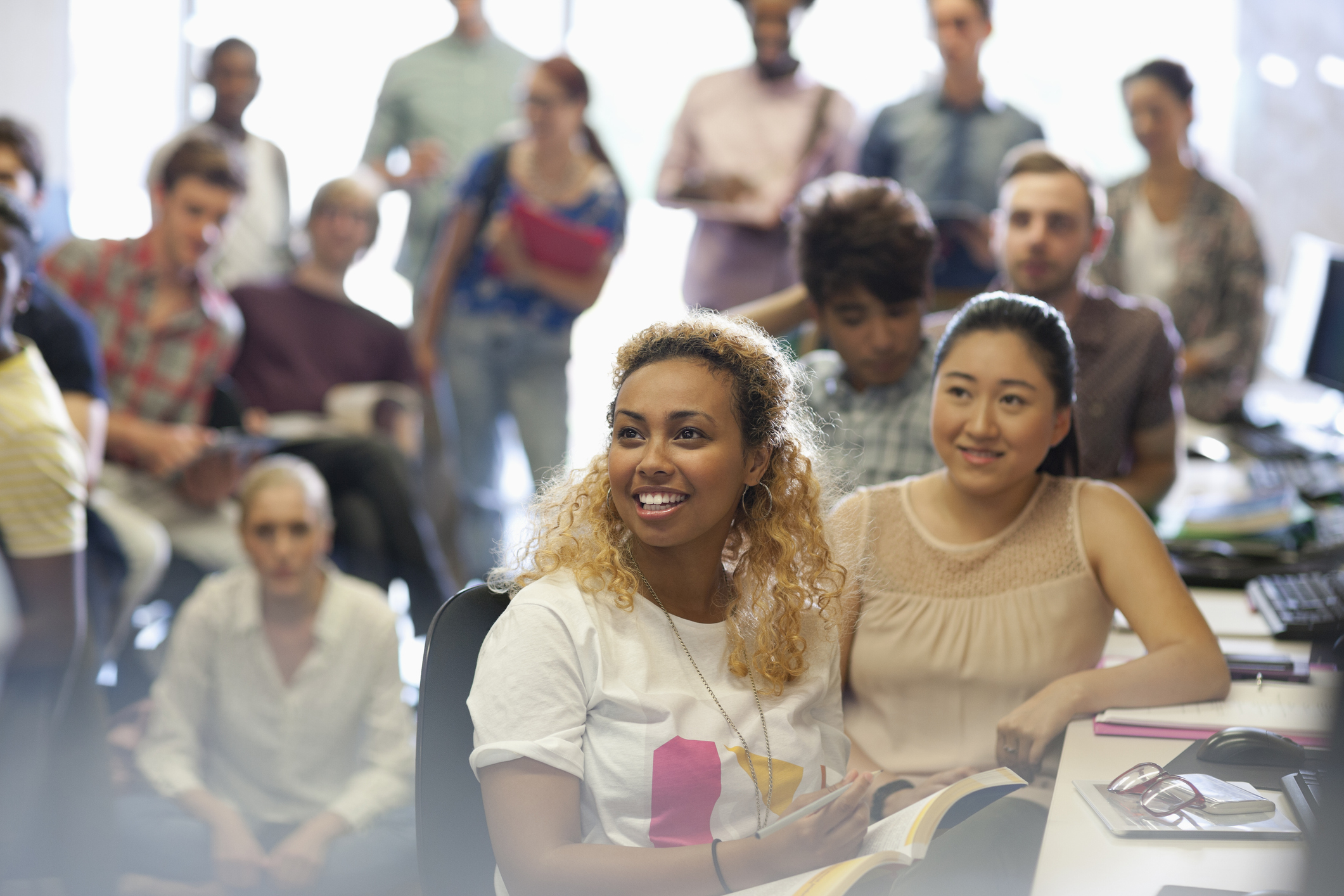 group of propsective students listening to a financial aid presentation