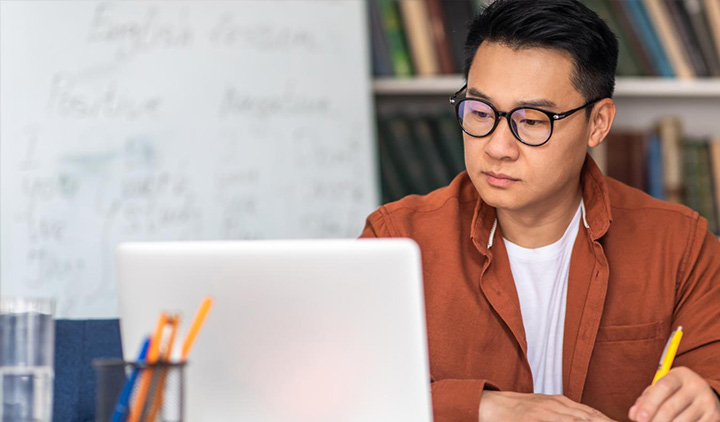 Person looking at laptop
