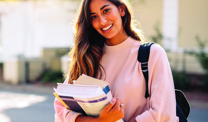 person carrying books