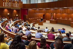 A class taking place in a mock court room.