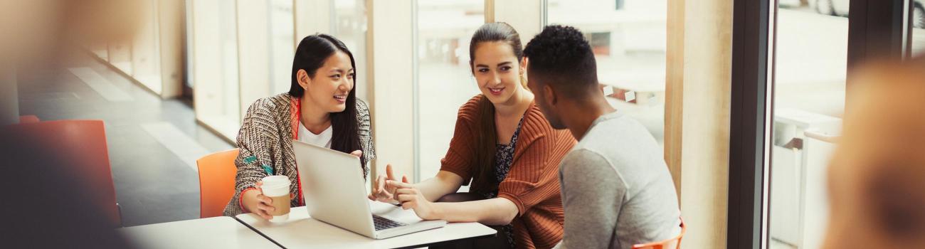 Students around a laptop