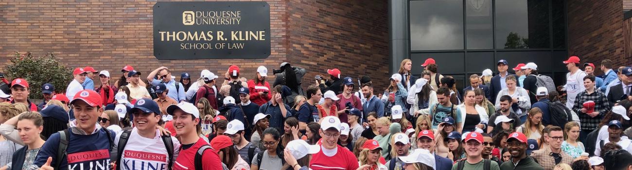 Students and faculty on law school steps