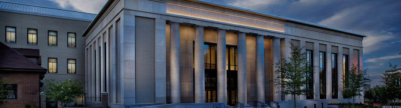 Entrance to the University of South Carolina School of Law at dusk.