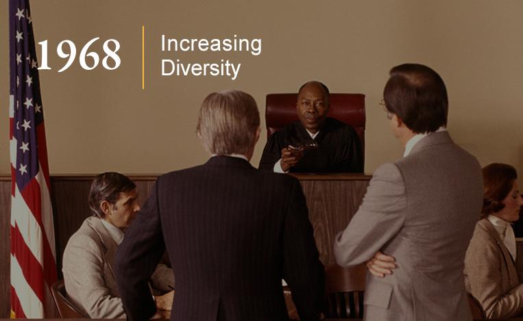 An African American judge presides over a courtroom trial.