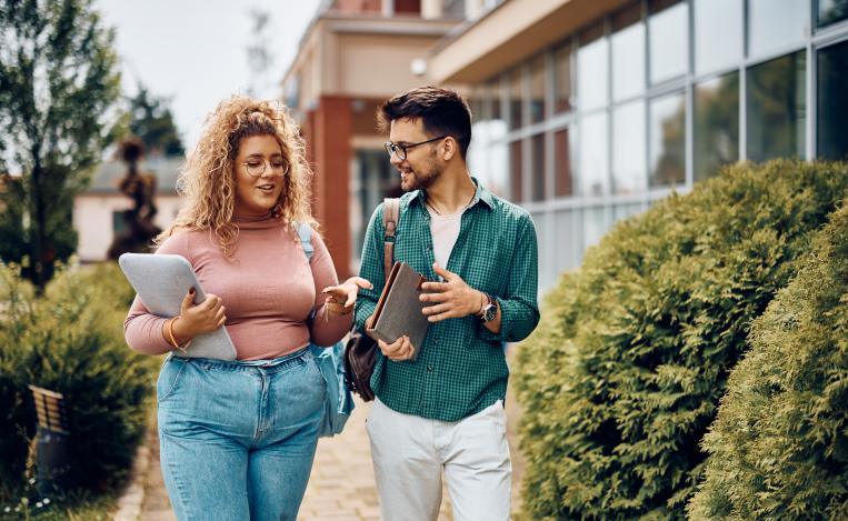 students talking on campus