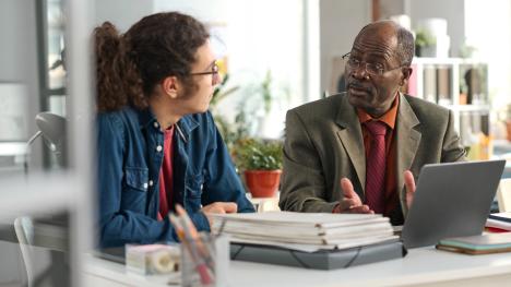 An academic support professional advises a student