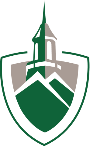 The image is a logo featuring a stylized tower with a spire, set against a mountainous background. The tower is gray with green and white accents, and the mountains below are green with white peaks. The entire design is enclosed within a green, shield-shaped border on a black background.