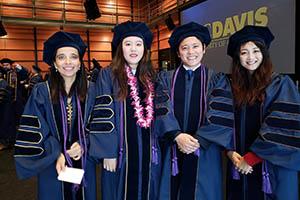Graduates pose for a photo at UC Davis School of Law commencement ceremony
