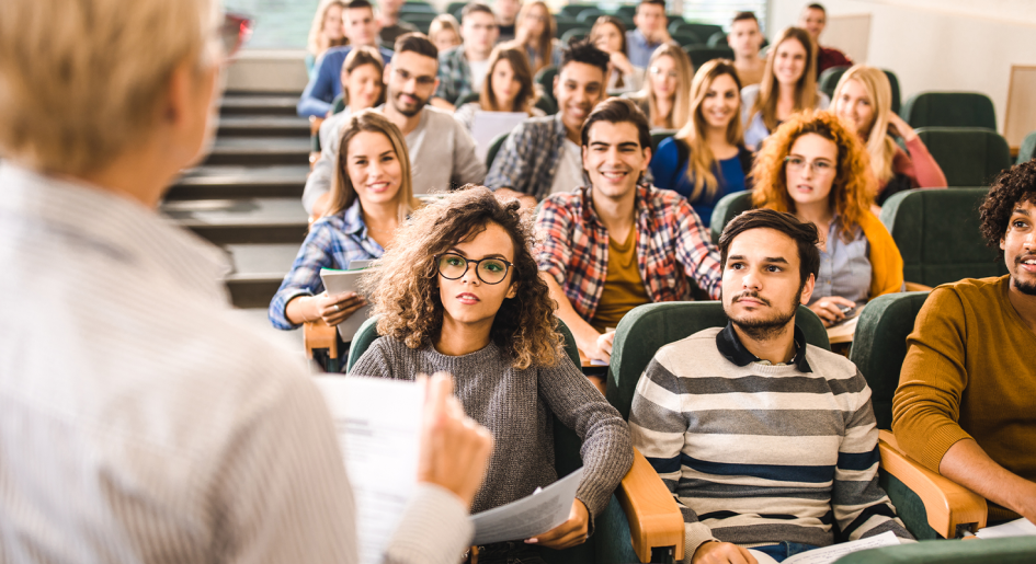 A teacher addresses a class