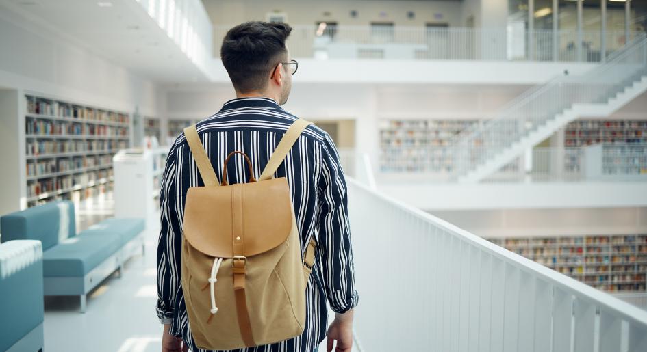 Law student with backpack.