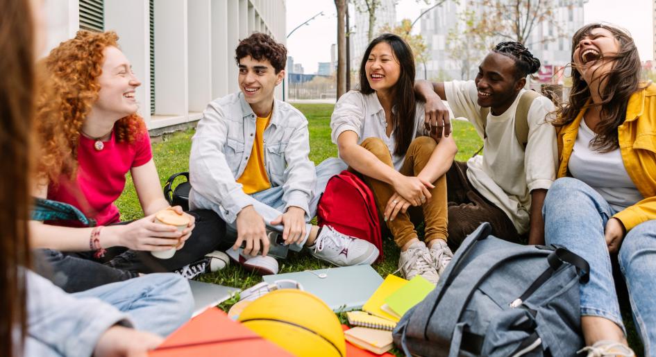 a group of law students sits together, smiling