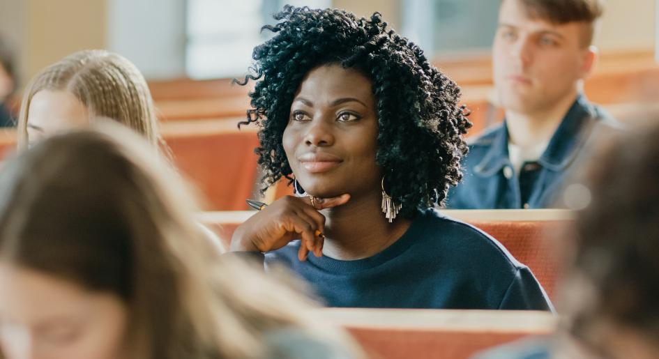 Law student listing in lecture hall