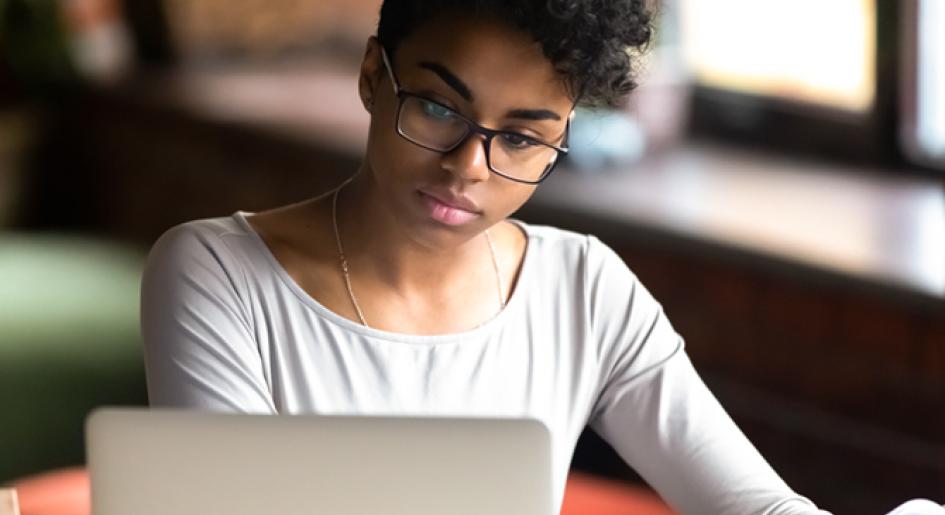 LSAT taker preparing with Khan Academy prep tools on a laptop