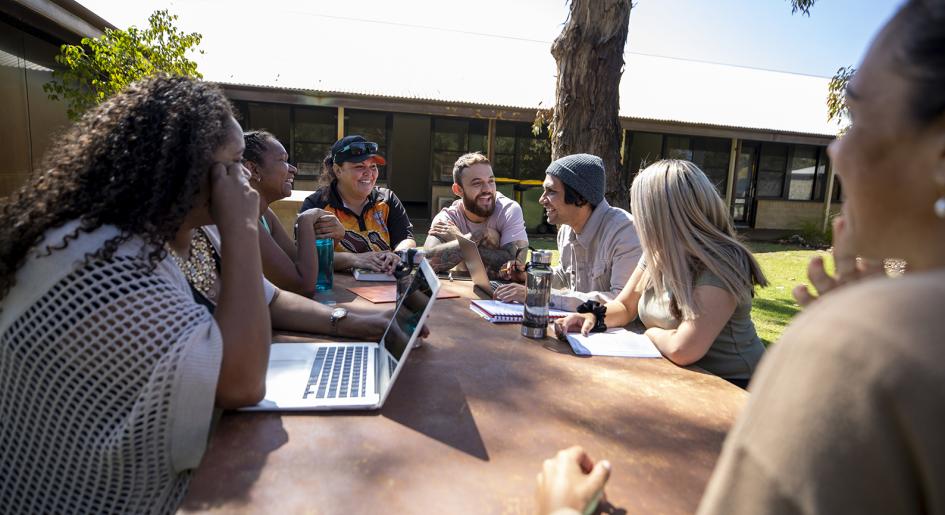 Students studying outside.