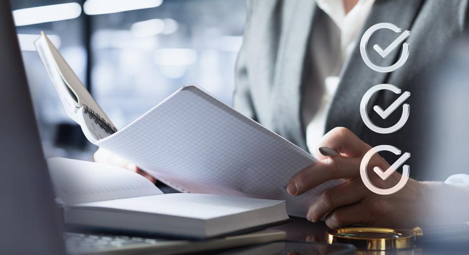 Person looking at report at laptop