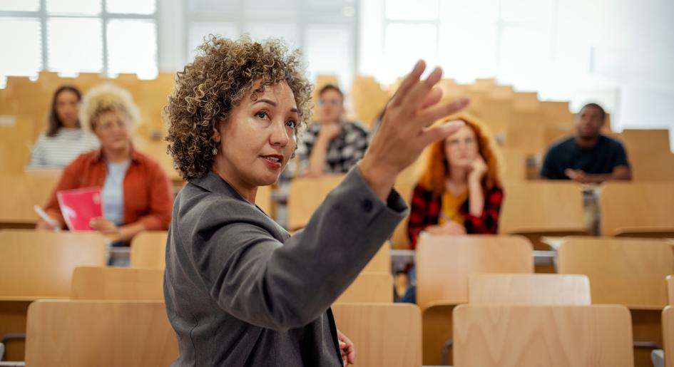 Law professor gesturing during lecture