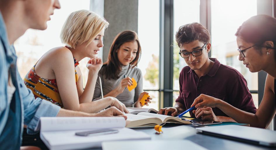 Law students studying at table