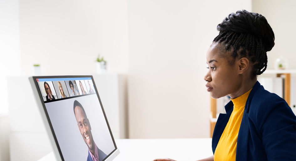 law student attending online forum on laptop