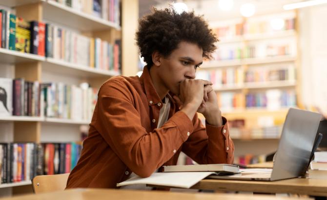 A student studying at a table