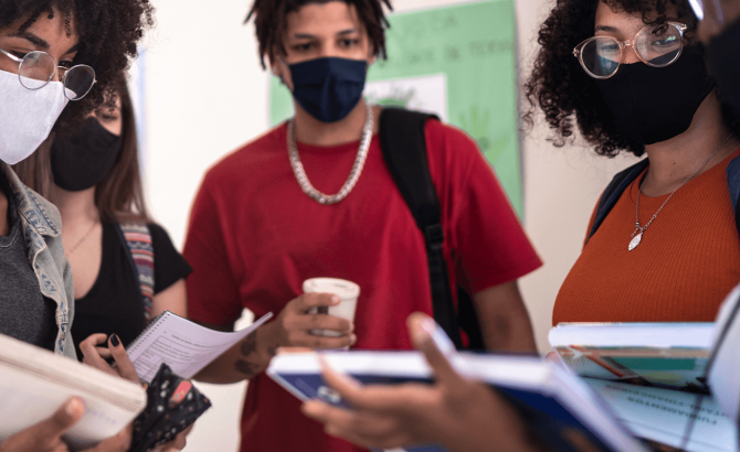 Law students gathered wearing PPE.