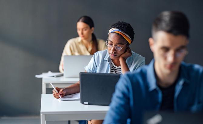 Law students at their desks in classroom