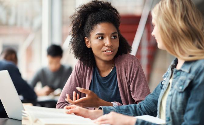 One woman counsels another