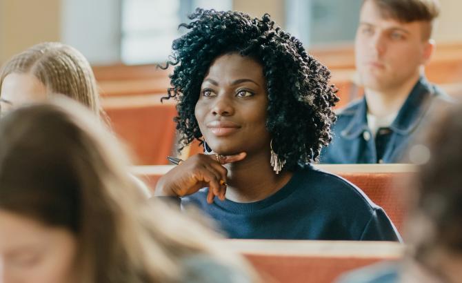 Law student listing in lecture hall