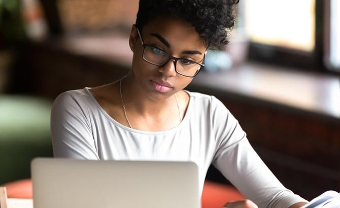 LSAT taker preparing with Khan Academy prep tools on a laptop