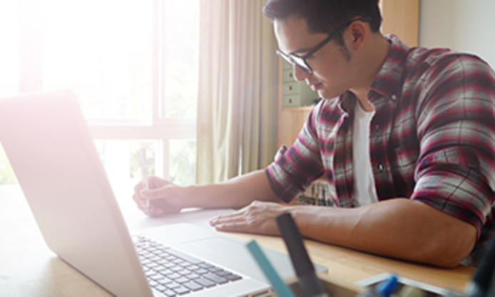 Student on Laptop